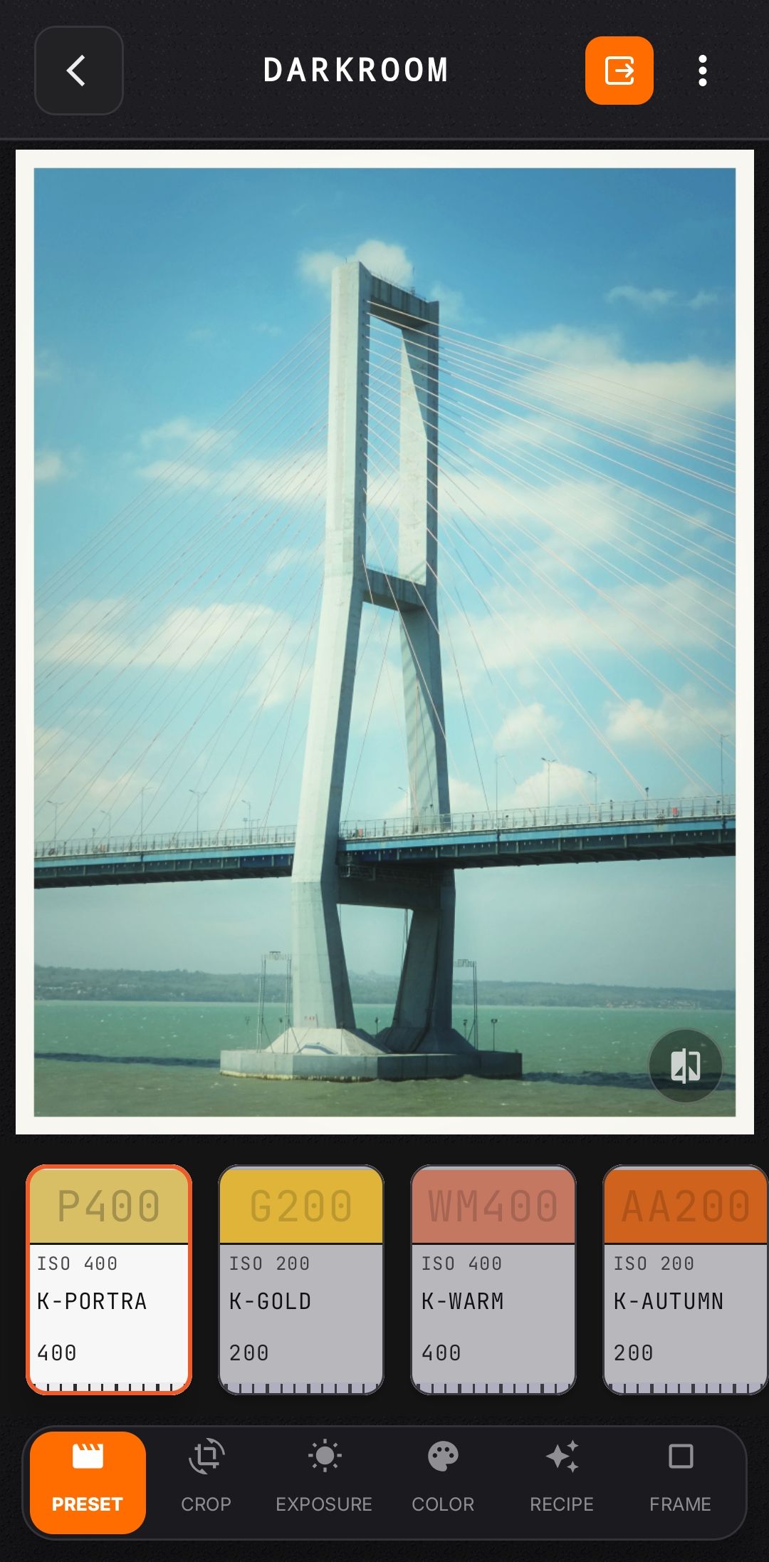 Photo in NeoFilm mobile darkroom being re-developed with custom borders and date stamp